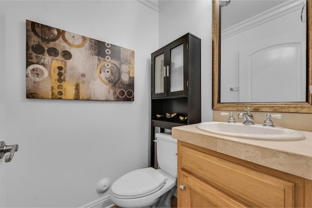 7132 Farralone Ave Unit 203, Canoga Park, CA 91303 - bathroom with vanity, ornamental molding, and toilet
