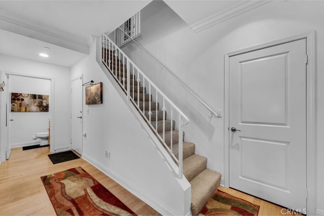 7132 Farralone Ave Unit 203, Canoga Park, CA 91303 - staircase featuring recessed lighting, baseboards, ornamental molding, and wood finished floors