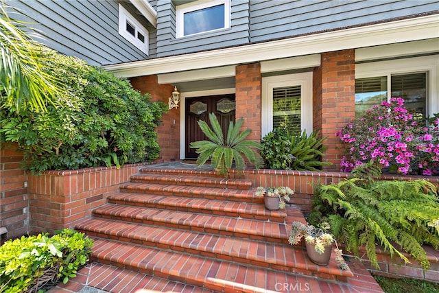 25122 Black Horse Ln, Laguna Hills, CA 92653 - view of exterior entry featuring brick siding