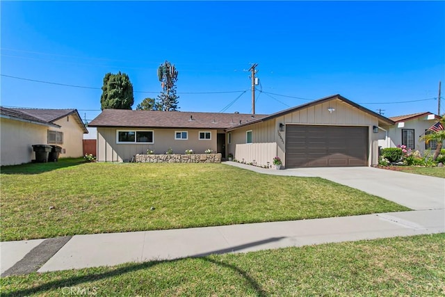 ranch-style house featuring an attached garage, a front yard, and concrete driveway