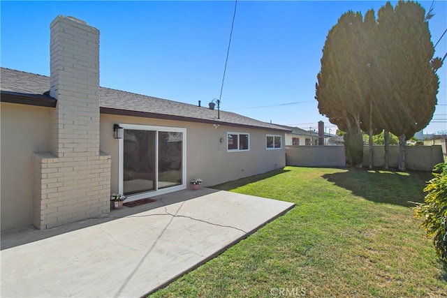 exterior space featuring a patio area and fence