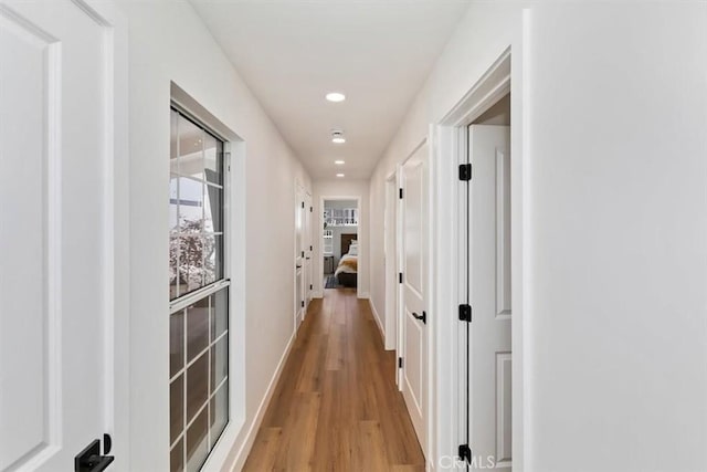 33935 Violet Lantern St, Dana Point, CA 92629 - hallway with recessed lighting, baseboards, and light wood finished floors