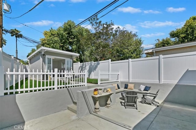 33935 Violet Lantern St, Dana Point, CA 92629 - view of patio / terrace featuring an outdoor living space, a fenced front yard, and an outdoor structure