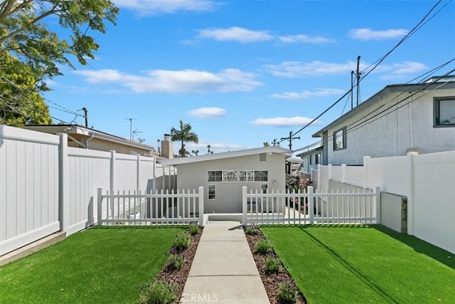 33935 Violet Lantern St, Dana Point, CA 92629 - view of front of home featuring a fenced backyard, stucco siding, and a front lawn