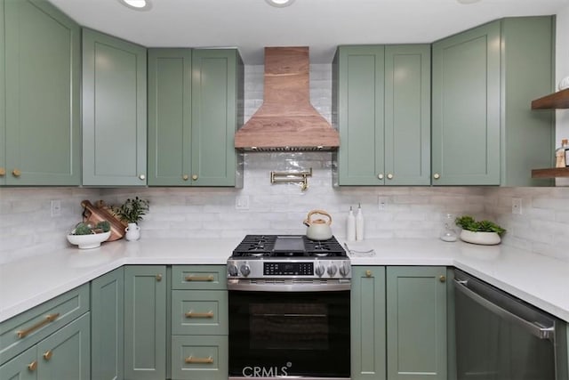 33935 Violet Lantern St, Dana Point, CA 92629 - kitchen with open shelves, appliances with stainless steel finishes, tasteful backsplash, custom exhaust hood, and green cabinets