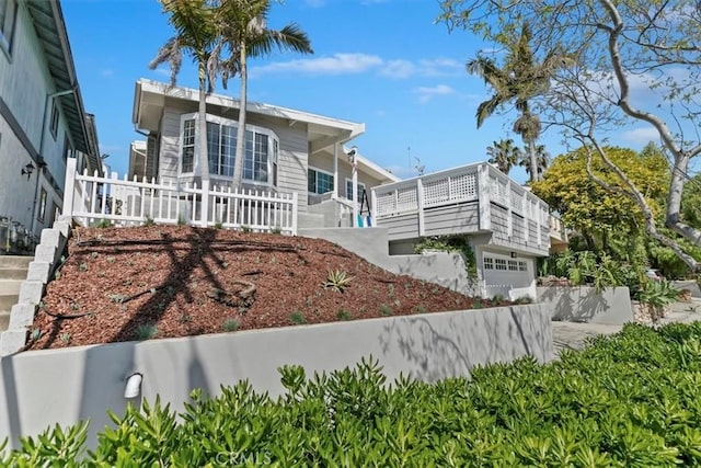 33935 Violet Lantern St, Dana Point, CA 92629 - view of front of house featuring a garage and a balcony