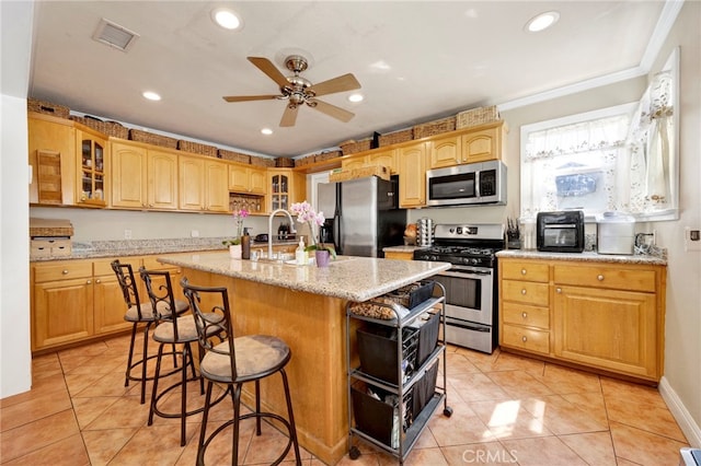 14948 Flomar Dr, Whittier, CA 90603 - kitchen with open shelves, stainless steel appliances, a ceiling fan, recessed lighting, and visible vents