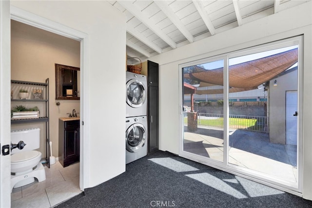 14948 Flomar Dr, Whittier, CA 90603 - laundry area featuring stacked washer and dryer, laundry area, a sink, dark colored carpet, and wooden ceiling