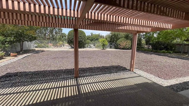 view of patio featuring a fenced backyard and a pergola