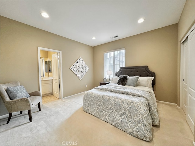 bedroom featuring light carpet, a closet, recessed lighting, and visible vents