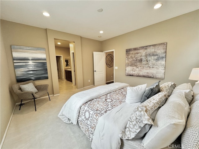 bedroom featuring recessed lighting, baseboards, ensuite bath, and light carpet