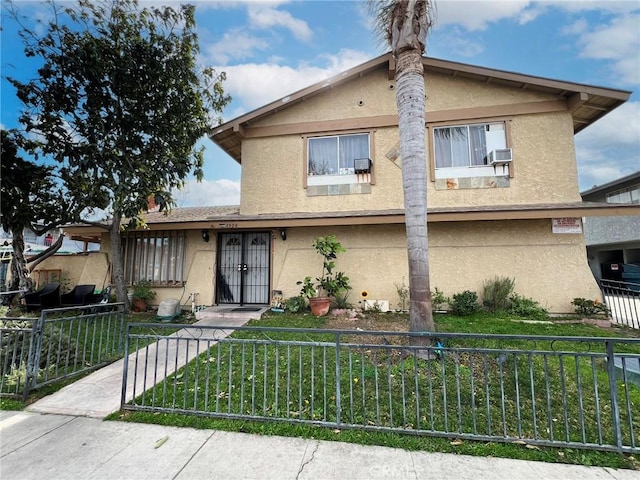 1908 E Coral Ave, Orange, CA 92865 - view of front of property featuring a fenced front yard, stucco siding, french doors, and a front yard