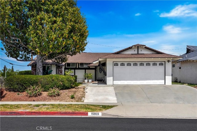 15803 Silvergrove Dr, Whittier, CA 90604 - ranch-style home featuring a garage, stucco siding, and driveway