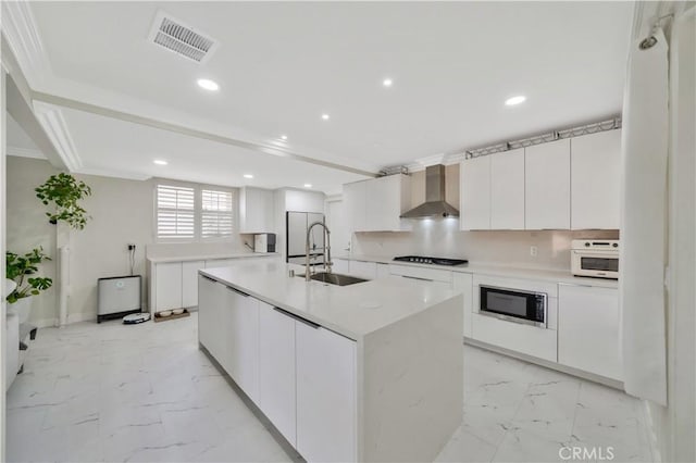 15803 Silvergrove Dr, Whittier, CA 90604 - kitchen featuring a sink, marble finish floor, wall chimney exhaust hood, visible vents, and black appliances