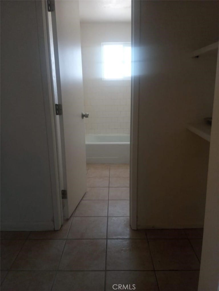 13345 Mesquite Rd, Whitewater, CA 92282 - corridor featuring light tile patterned floors