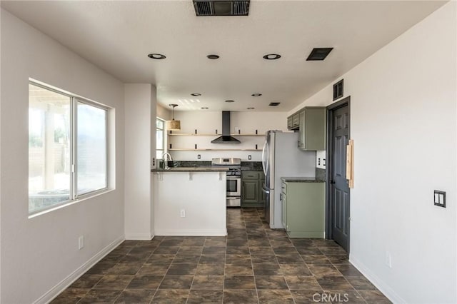 kitchen with wall chimney range hood, visible vents, dark countertops, appliances with stainless steel finishes, and open shelves