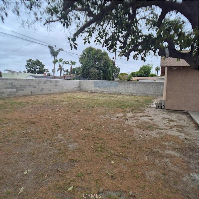 804 S Mayo Ave, Compton, CA 90221 - view of yard featuring a fenced backyard