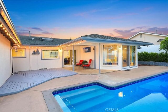 108 N Hacienda Ave, Glendora, CA 91741 - back of property with a patio area, an outdoor pool, and stucco siding