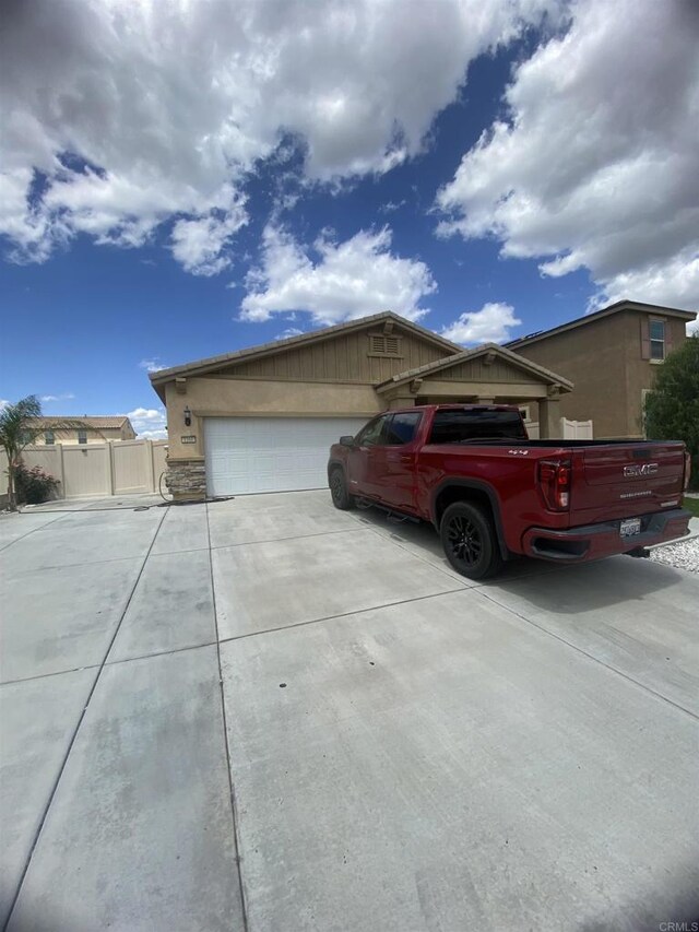 1160 Vallejo St, Perris, CA 92571 - view of front of home featuring concrete driveway, an attached garage, and stucco siding