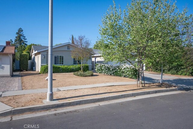 22437 Haynes St, West Hills, CA 91307 - view of front of home featuring fence and stucco siding