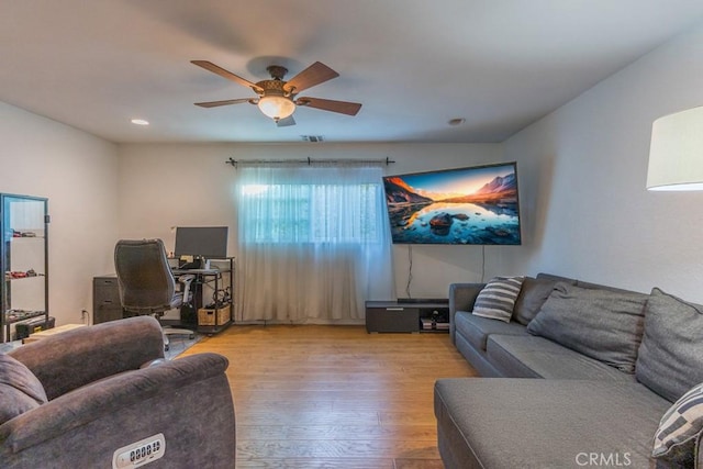 22437 Haynes St, West Hills, CA 91307 - living room with ceiling fan and wood finished floors