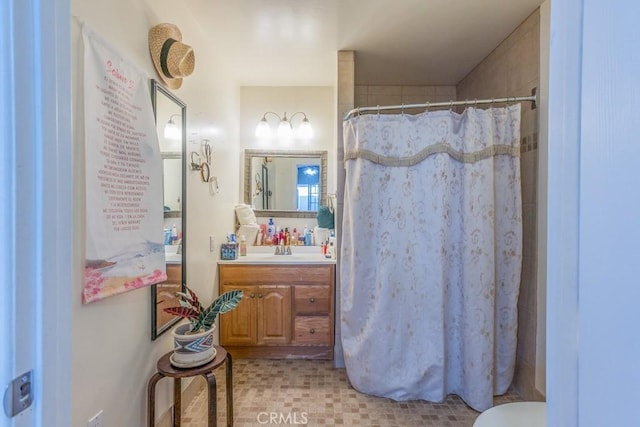 22437 Haynes St, West Hills, CA 91307 - full bath featuring vanity, toilet, and a shower with curtain