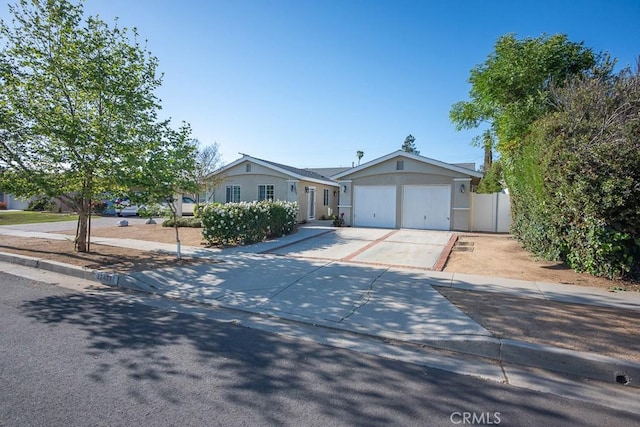 22437 Haynes St, West Hills, CA 91307 - ranch-style house with concrete driveway and an attached garage