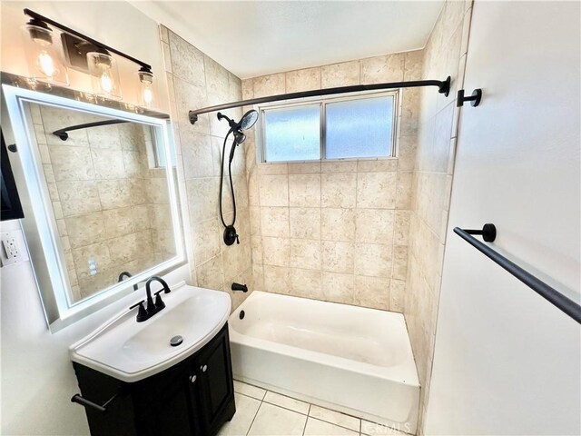 full bath with shower / tub combination, tile patterned flooring, and vanity
