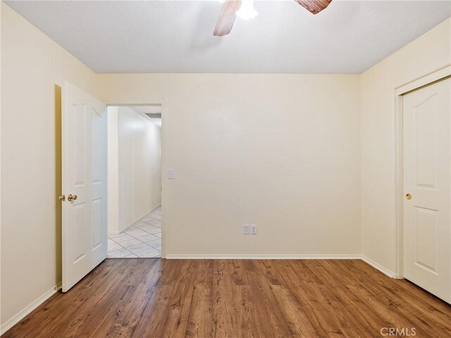 18668 Kamana Rd, Apple Valley, CA 92307 - interior space featuring baseboards, ceiling fan, and wood finished floors