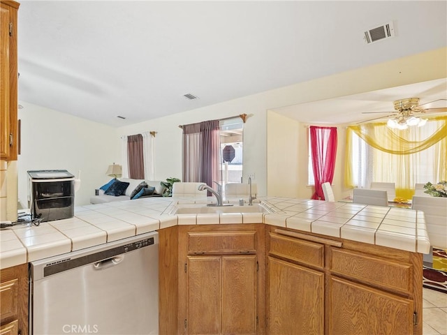 18668 Kamana Rd, Apple Valley, CA 92307 - kitchen with visible vents, open floor plan, ceiling fan, a sink, and dishwasher