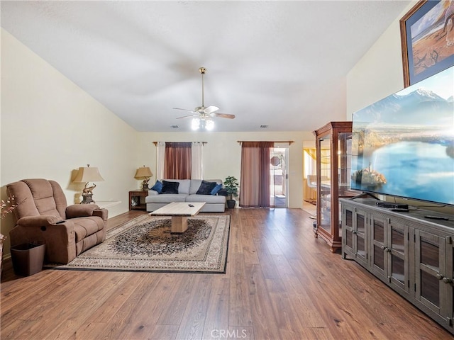 18668 Kamana Rd, Apple Valley, CA 92307 - living room featuring ceiling fan, lofted ceiling, and hardwood / wood-style flooring