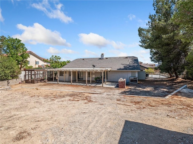 18668 Kamana Rd, Apple Valley, CA 92307 - back of house with a patio and stucco siding