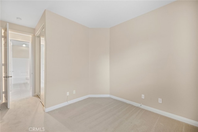 562 Silverhawk Dr, Corona, CA 92879 - unfurnished room with light carpet, baseboards, and a smoke detector