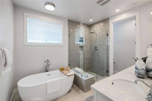 1524 Wollacott St, Redondo Beach, CA 90278 - full bathroom with a shower stall, a freestanding tub, recessed lighting, double vanity, and tile patterned flooring