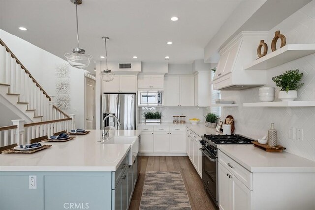 1524 Wollacott St, Redondo Beach, CA 90278 - kitchen featuring stainless steel appliances, open shelves, white cabinets, dark wood-style floors, and a sink