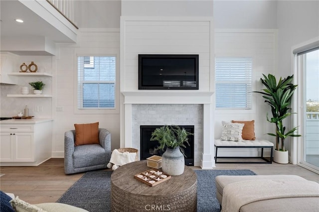 1524 Wollacott St, Redondo Beach, CA 90278 - living room with a brick fireplace and light wood-type flooring