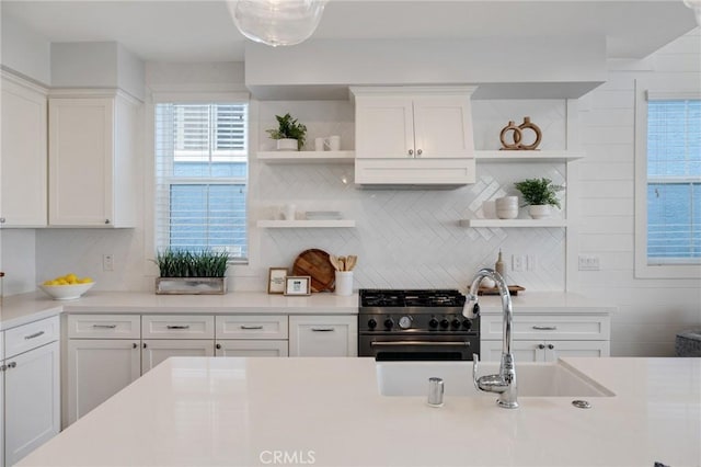 1524 Wollacott St, Redondo Beach, CA 90278 - kitchen with open shelves, high end range, backsplash, and light countertops