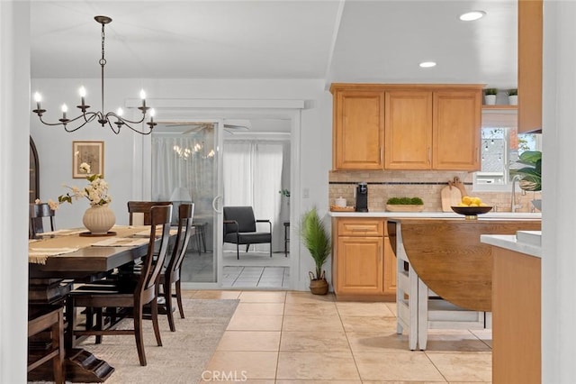 6582 Corrine Cir, Huntington Beach, CA 92647 - dining space with light tile patterned floors, recessed lighting, and a notable chandelier