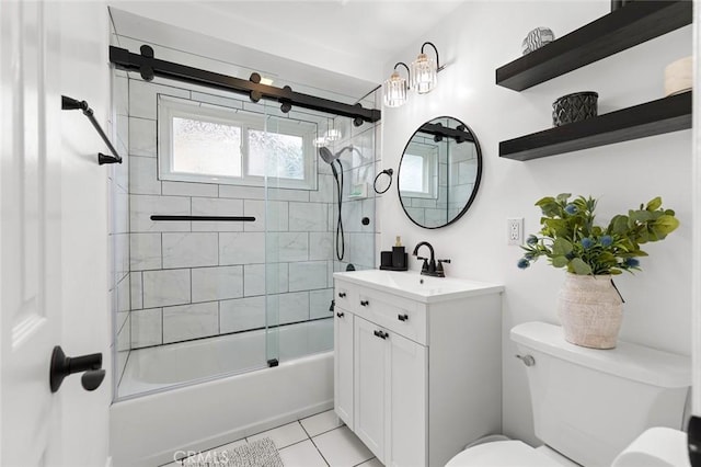 6582 Corrine Cir, Huntington Beach, CA 92647 - full bathroom featuring vanity, tile patterned floors, bath / shower combo with glass door, and toilet