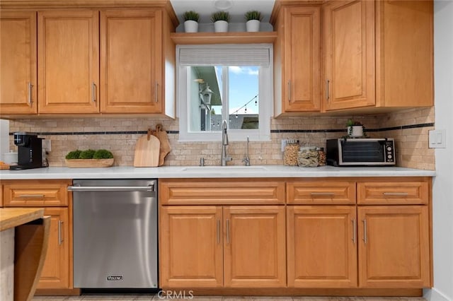 6582 Corrine Cir, Huntington Beach, CA 92647 - kitchen featuring a sink, light countertops, a toaster, and dishwasher