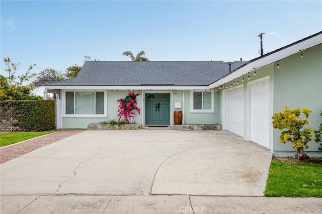 6582 Corrine Cir, Huntington Beach, CA 92647 - ranch-style home with stucco siding, driveway, a shingled roof, and a garage