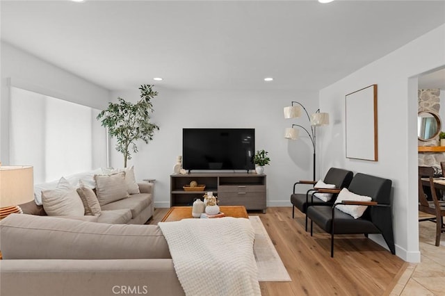 6582 Corrine Cir, Huntington Beach, CA 92647 - living area with recessed lighting, baseboards, and light wood-type flooring