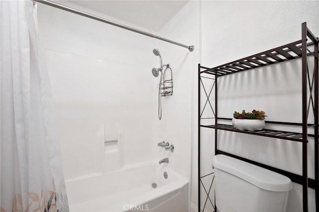 full bath featuring toilet and shower / bath combination with curtain
