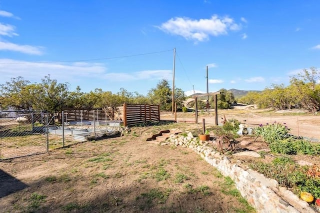 view of yard featuring fence