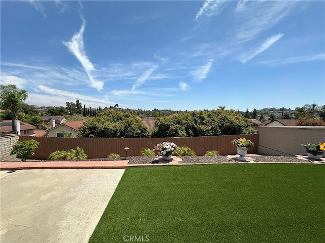 view of yard with fence