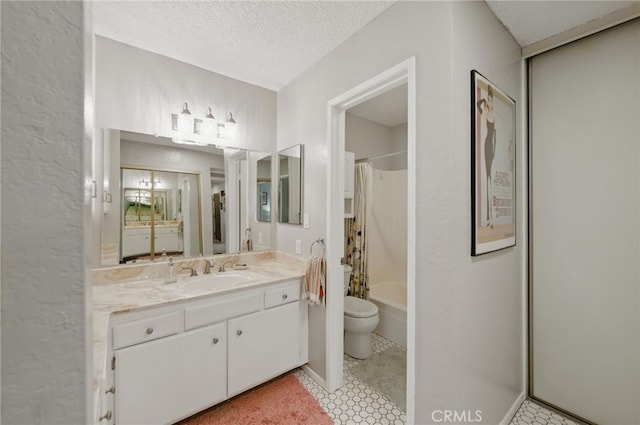 bathroom with toilet, a textured ceiling, shower / bath combination with curtain, and vanity
