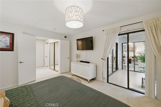 unfurnished bedroom with access to outside, visible vents, and light carpet
