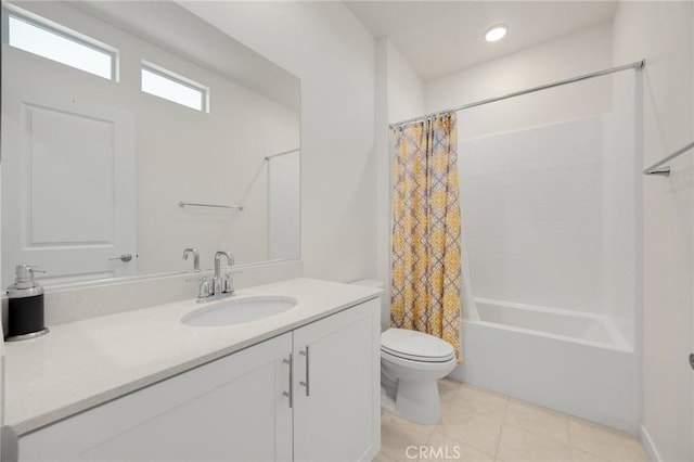full bathroom with tile patterned floors, shower / bath combo with shower curtain, vanity, and toilet