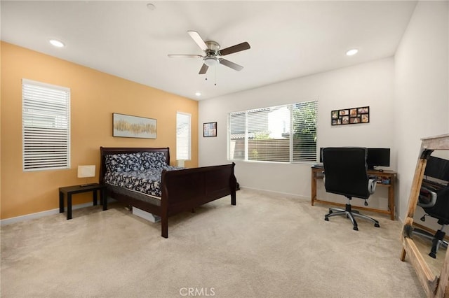 carpeted bedroom featuring recessed lighting, baseboards, and a ceiling fan