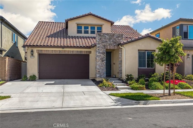 mediterranean / spanish home with stone siding, stucco siding, an attached garage, driveway, and a tile roof